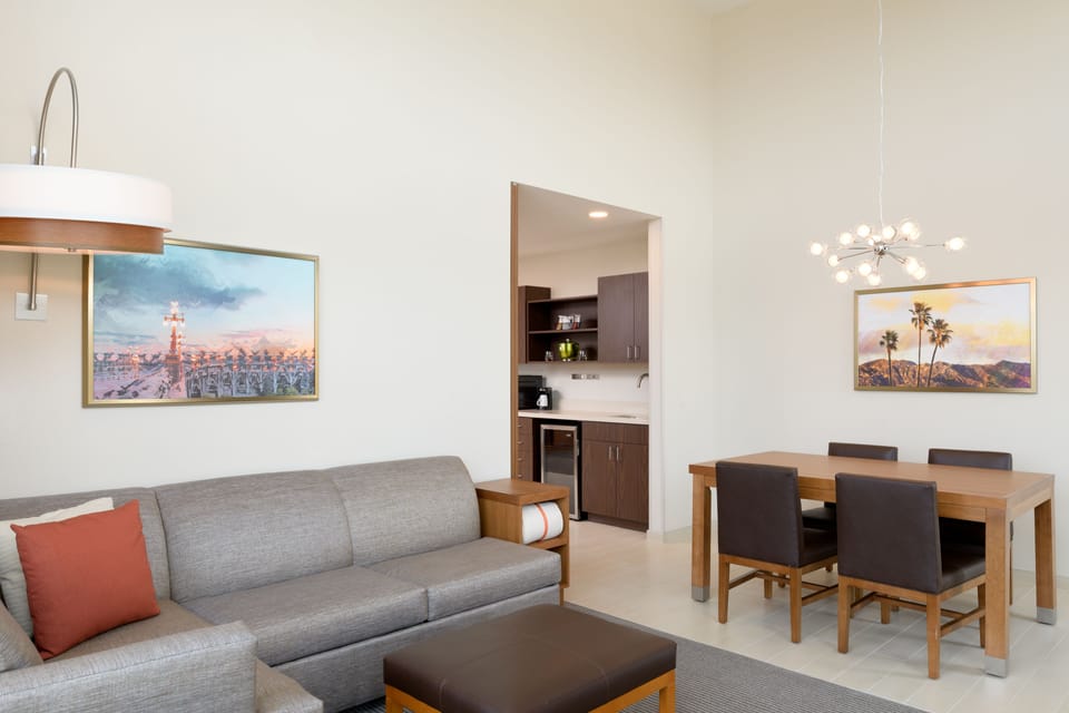 Suite, 1 King Bed with Sofa bed | Living area | Flat-screen TV