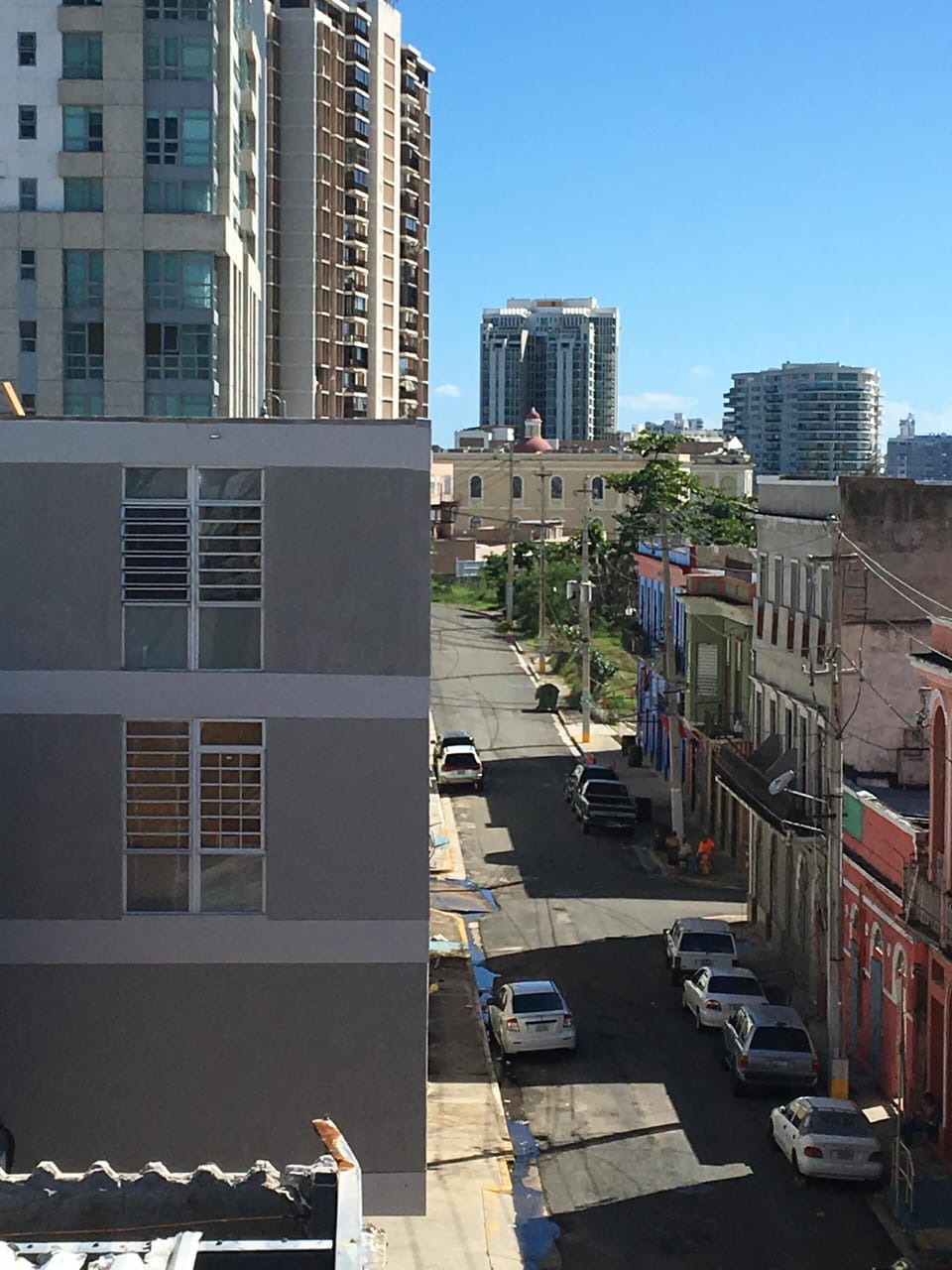 Partial view of San Agustin St. w/grocery store & Mexican restaurant close by.