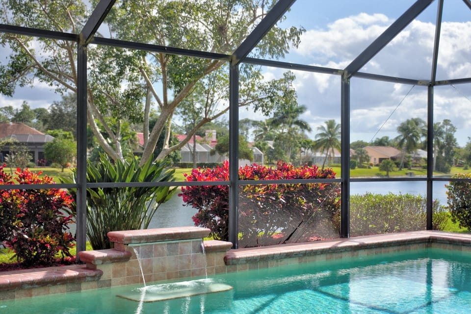 Beautifully maintained garden with tropical flowers and accents