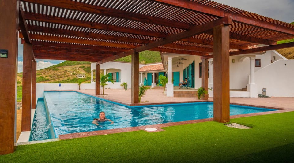 The 80 feet long NATURAL SALT WATER infinity pool is simply put INCREDIBLE!