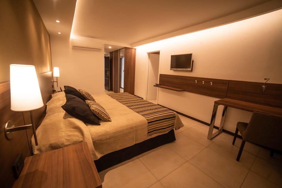 Egyptian cotton sheets, premium bedding, minibar, in-room safe