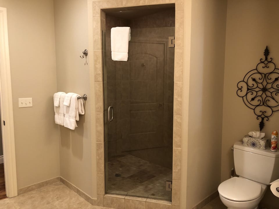 Tiled walk in shower in all four bathrooms.