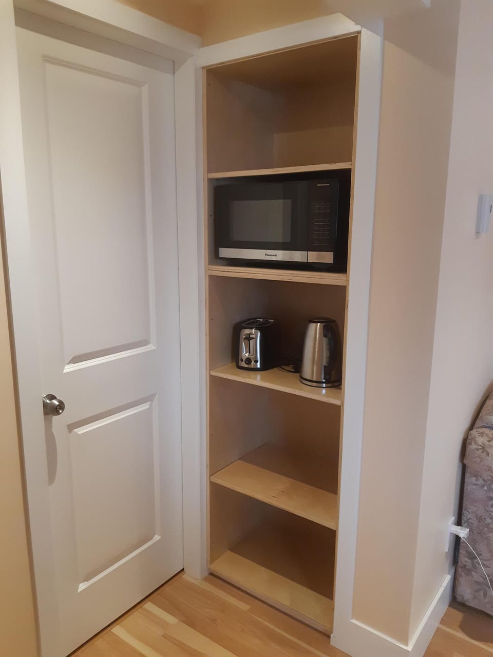 pantry and door to the bathroom