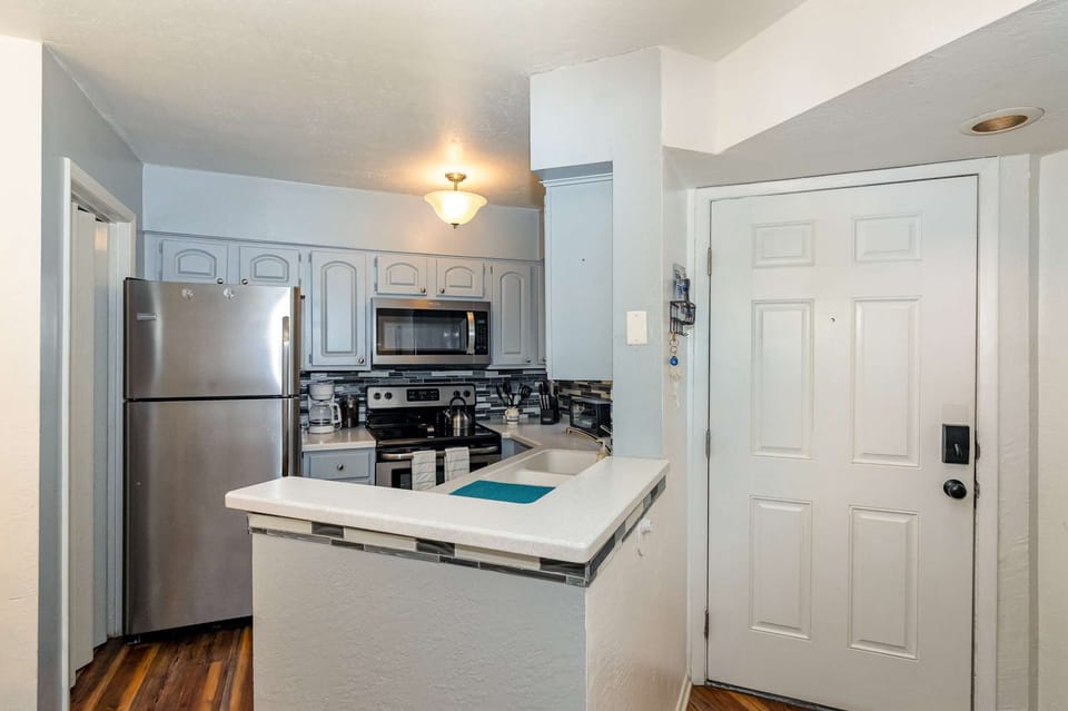 View of the kitchen with entry
