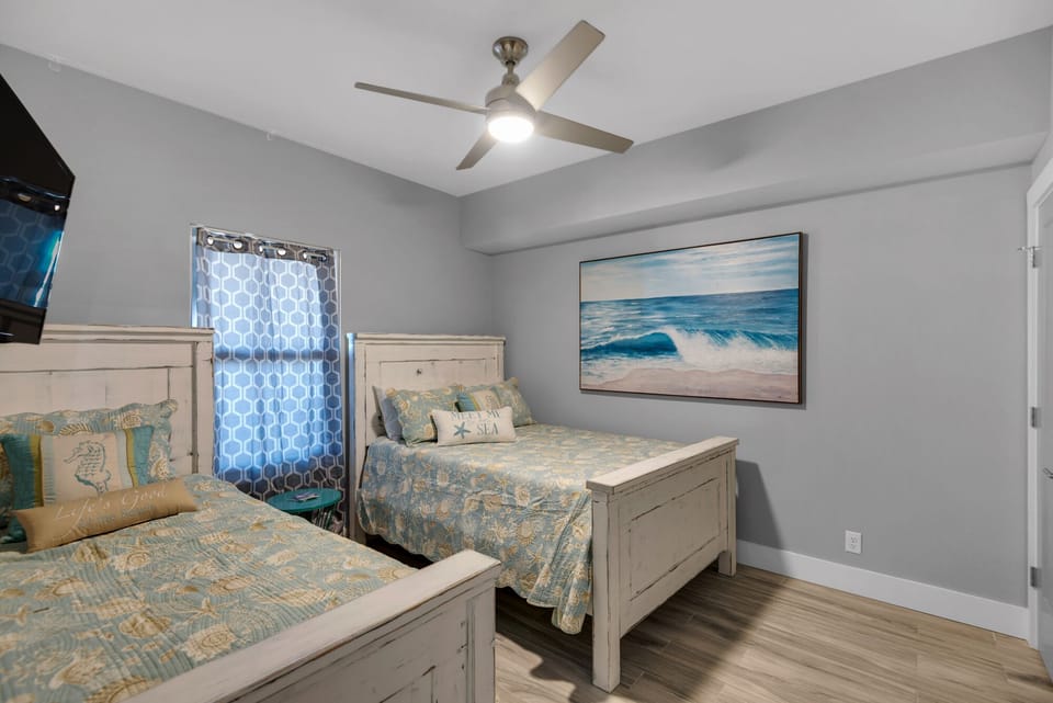 This is a Real Bedroom With a Closet, Dresser,  TV & Direct Bathroom Access.
