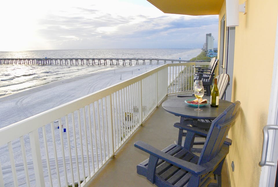Enjoy awesome sunsets over the pier from your balcony!