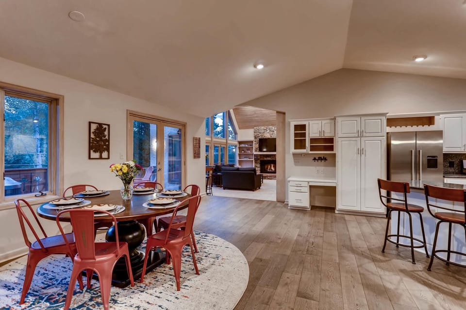 Open floor plan with dining/kitchen areas open to living