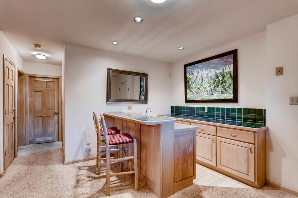 Downstairs bar area with sink