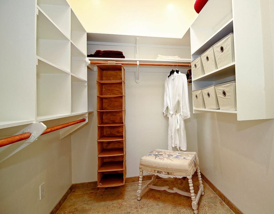 Master walk in closet, robes provided