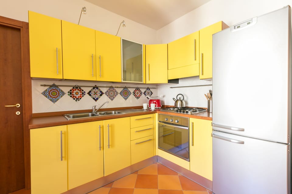 Apartment, 3 Bedrooms, Terrace | Private kitchen | Full-size fridge, coffee/tea maker, electric kettle, toaster oven