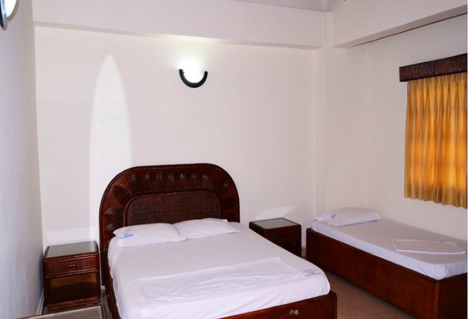 Family Apartment, Multiple Beds, Non Smoking | Free WiFi, bed sheets