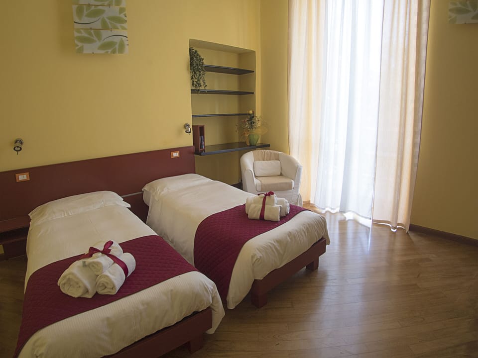 Family Quadruple Room, Balcony | Frette Italian sheets, premium bedding, down comforters, desk