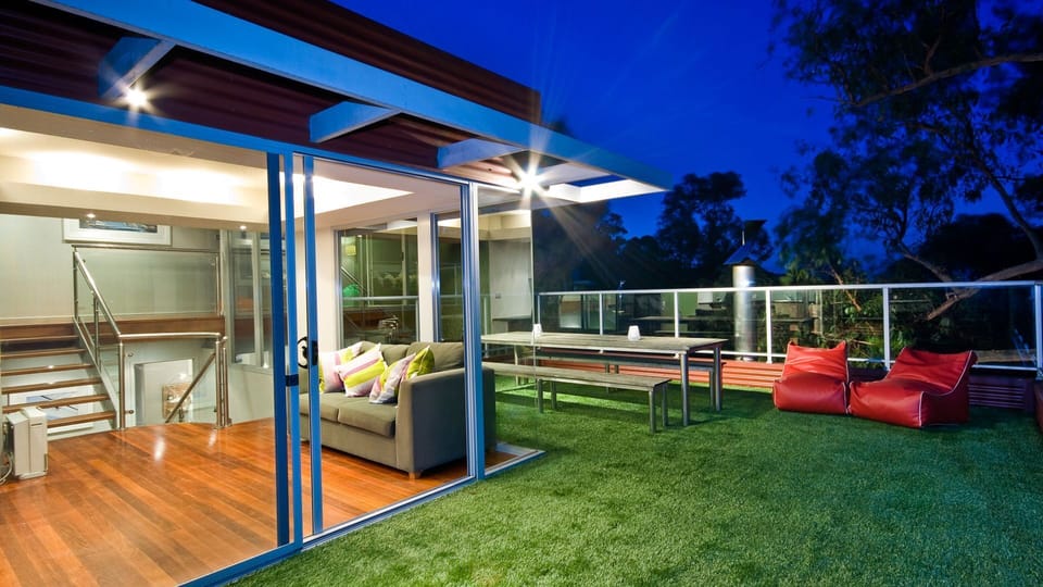 BBQ Deck with lawn and extensive views (note: sofa bed in room adjacent)