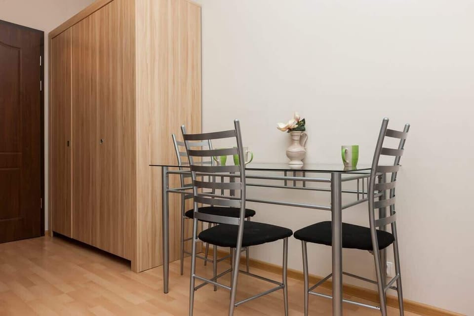 Wooden and elegant living area with capacious wardrobe, where the guests can store their clothes.