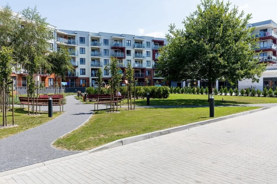 Green and friendly environment of the modern building in which the flat is located.