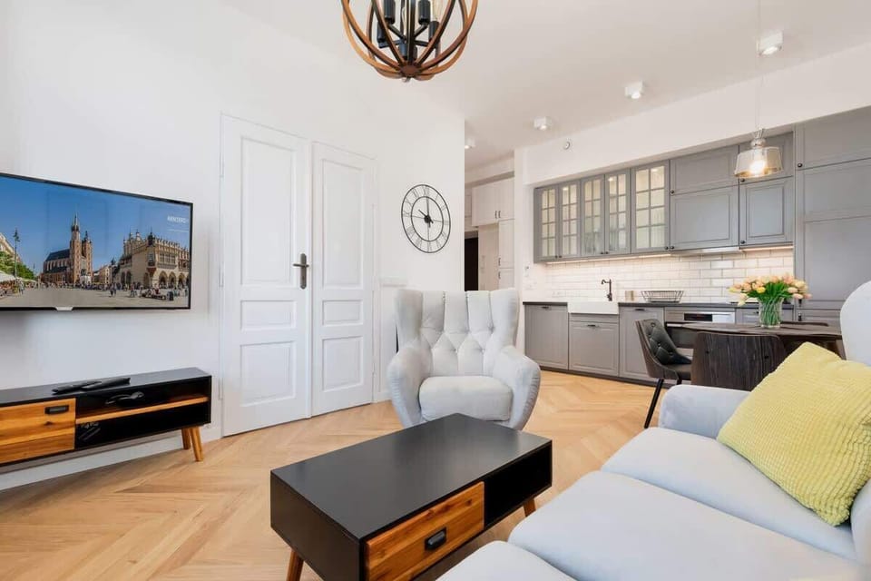 Living room of Starowiślna 54/21 with sofa, coffee table and tv