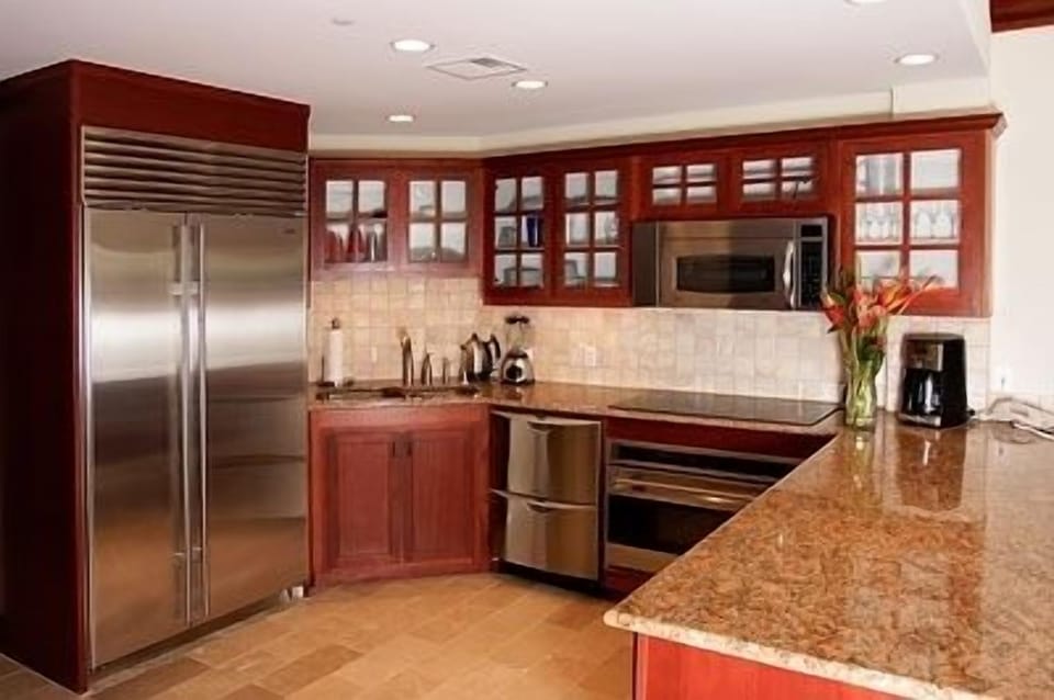 Gourmet Kitchen Stainless Steel Wolf and Subzero appliances and granite counters
