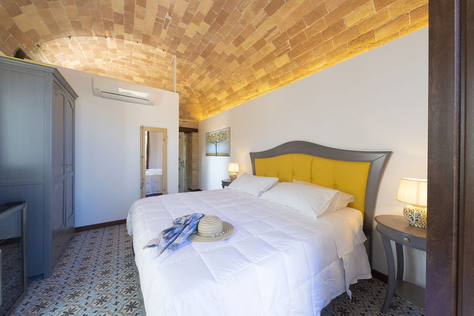 Arco | Memory foam beds, free minibar items, in-room safe