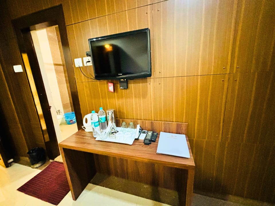 Premium Room | Blackout drapes, iron/ironing board, WiFi (free), bed sheets