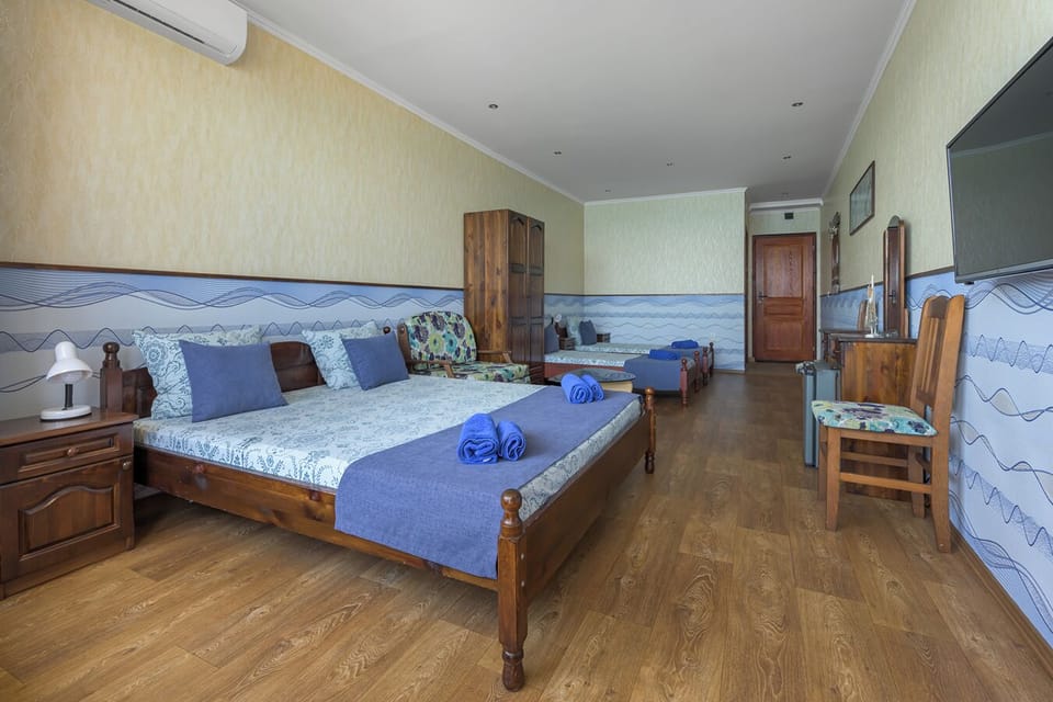 Quadruple Room, Balcony | Select Comfort beds, in-room safe, desk, soundproofing