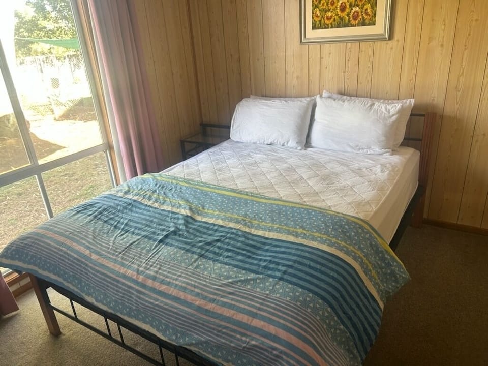 Bedroom 1 with ceiling fan 