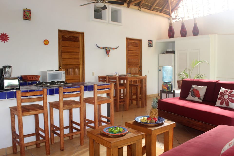 Upper level seating and dining area.