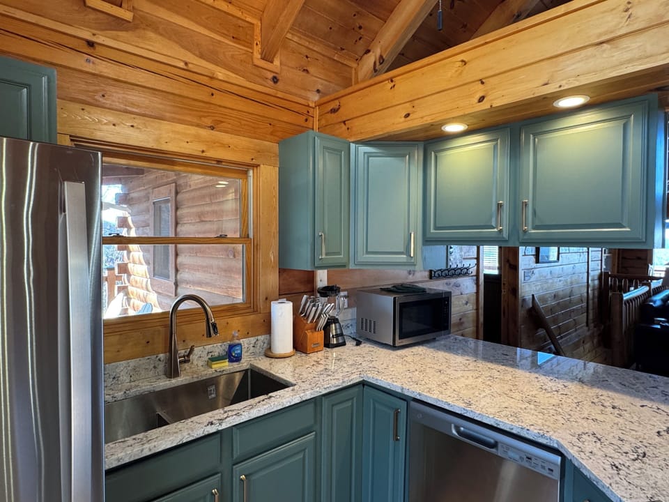 Kitchen features Granite & Stainless