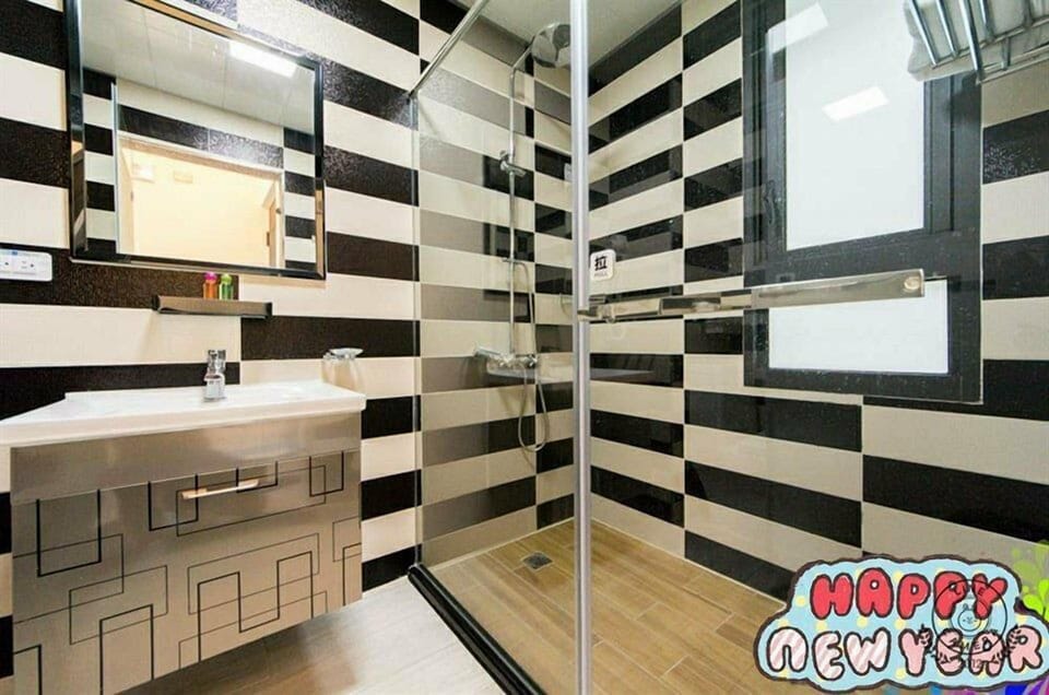 Standard Quadruple Room, 2 Double Beds, Non Smoking | Bathroom | Shower, free toiletries, hair dryer, slippers