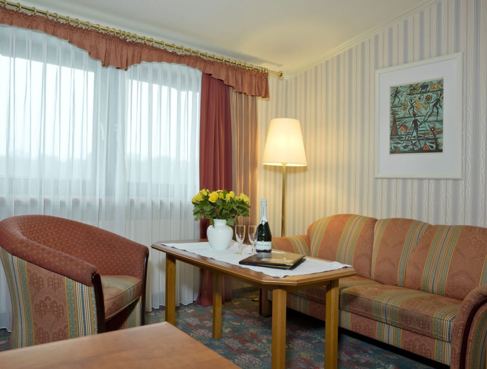 Superior Double Room, Garden View | Living area | Flat-screen TV