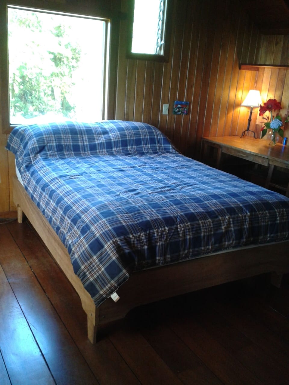 Queen-sized bed in the master bedroom. 