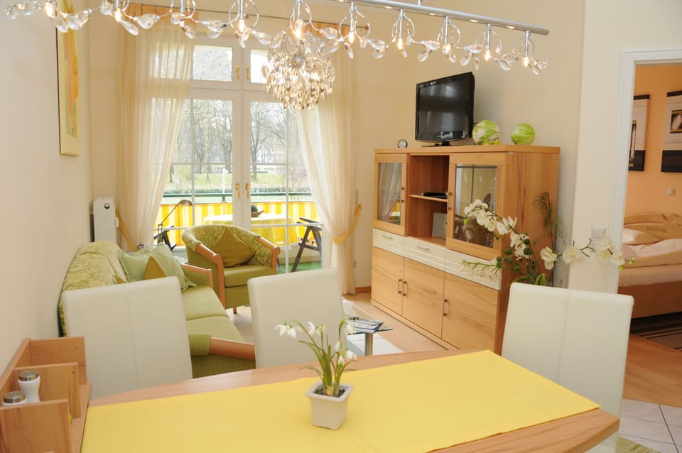 Comfort Apartment | Living area | Flat-screen TV