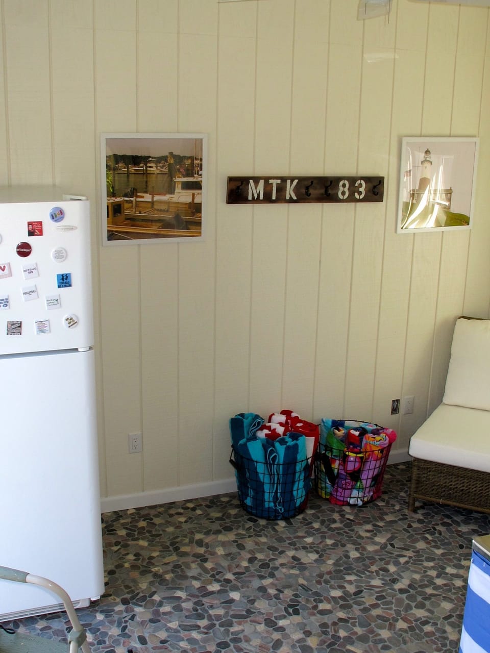 Full sized fridge, sitting area and plenty of beach/pool towels in cabana