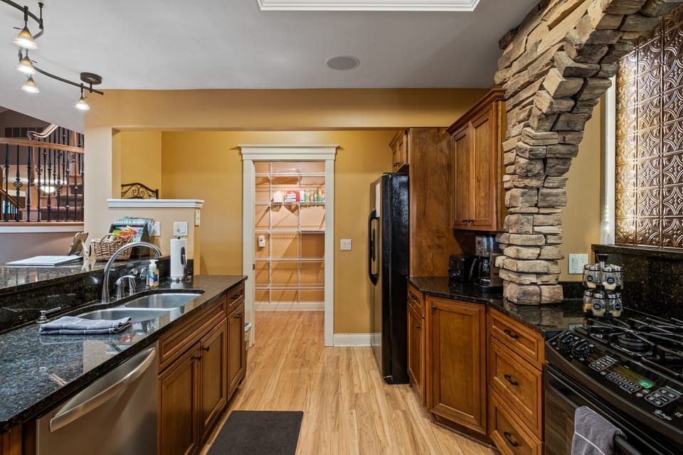 Kitchen with view to pantry.