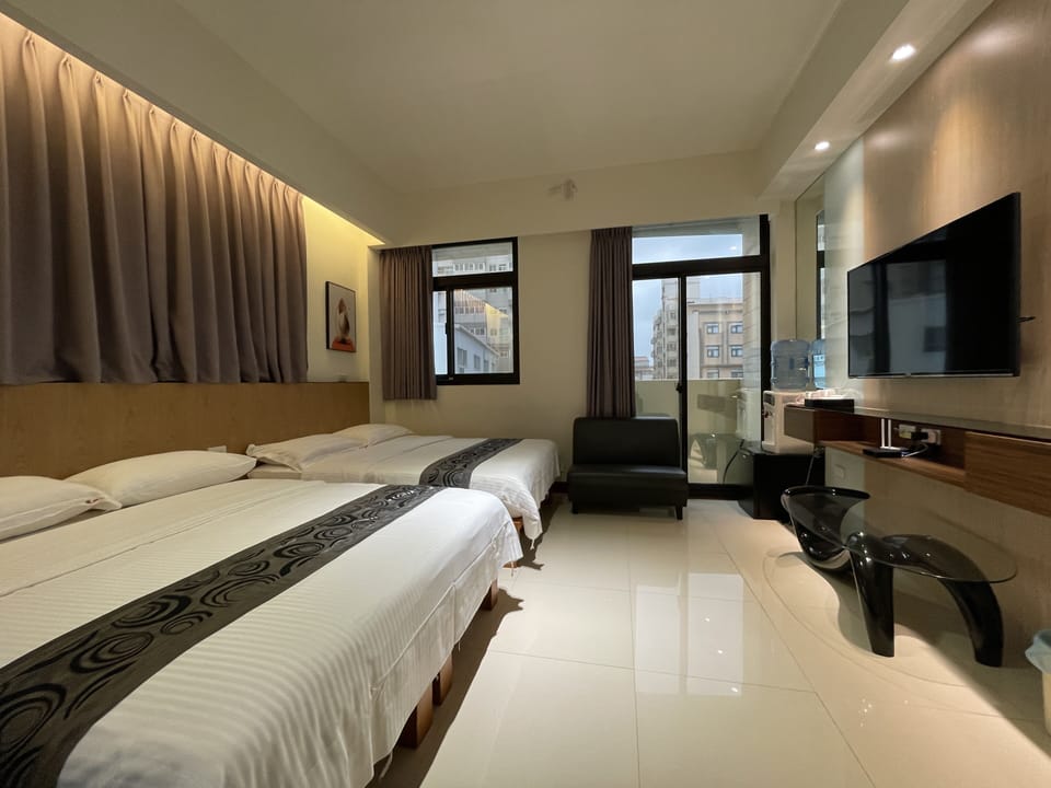 Sunshine Quadruple Room | Blackout drapes, soundproofing, free WiFi, bed sheets