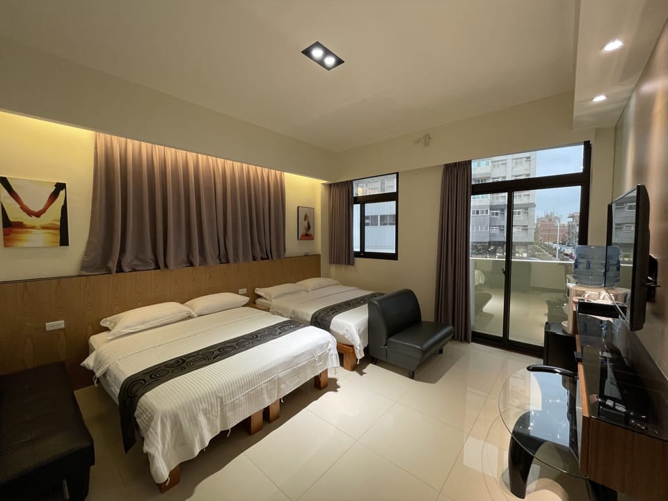Sunshine Quadruple Room | Blackout drapes, soundproofing, free WiFi, bed sheets