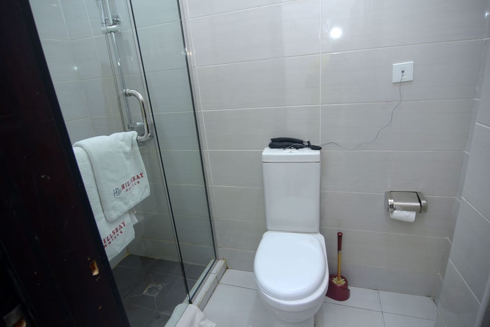 Basic Room, Non Smoking | Bathroom | Shower, free toiletries, hair dryer, towels