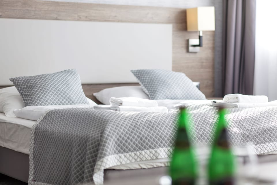 Premium bedding, blackout drapes, iron/ironing board, free WiFi
