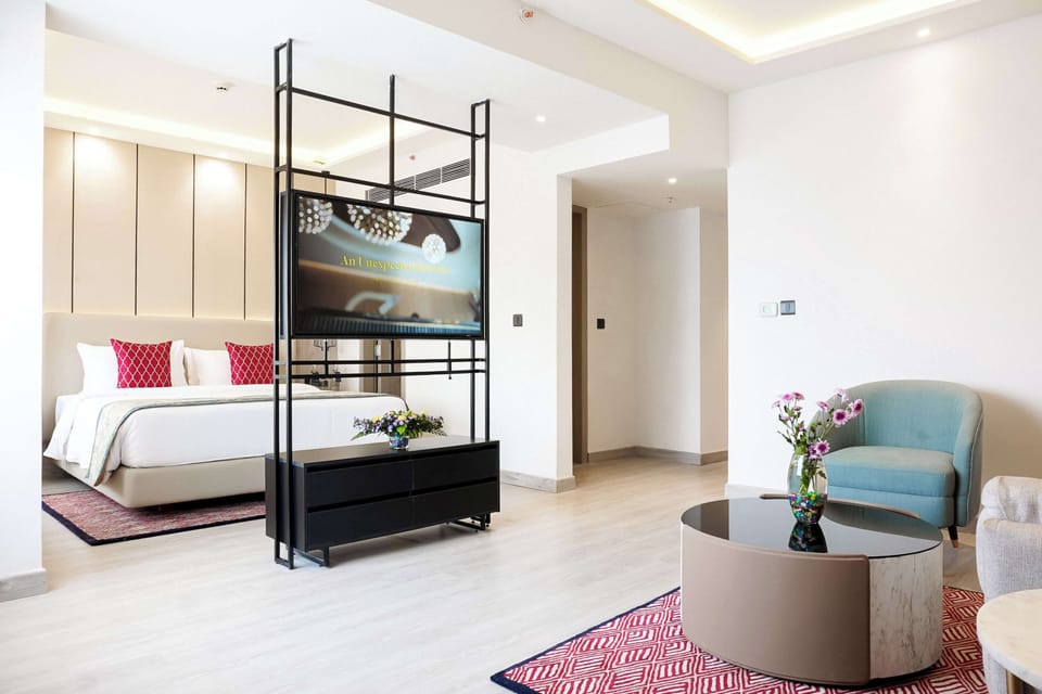 Junior Suite, 1 King Bed | Premium bedding, down comforters, minibar, in-room safe