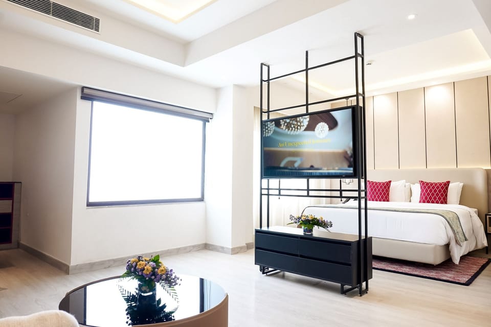 Junior Suite, 1 King Bed | Premium bedding, down comforters, minibar, in-room safe