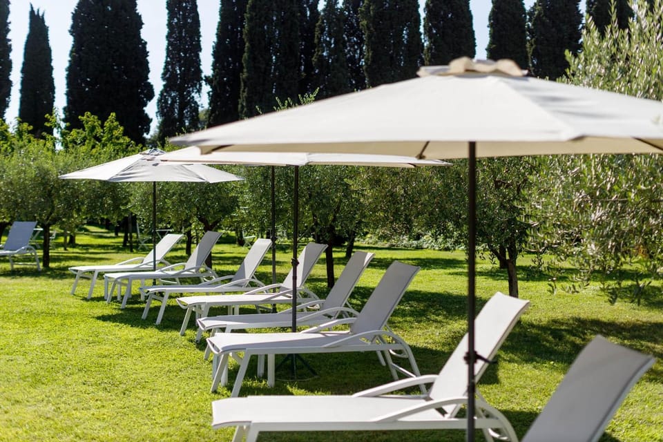 Indoor pool, seasonal outdoor pool, pool umbrellas, sun loungers