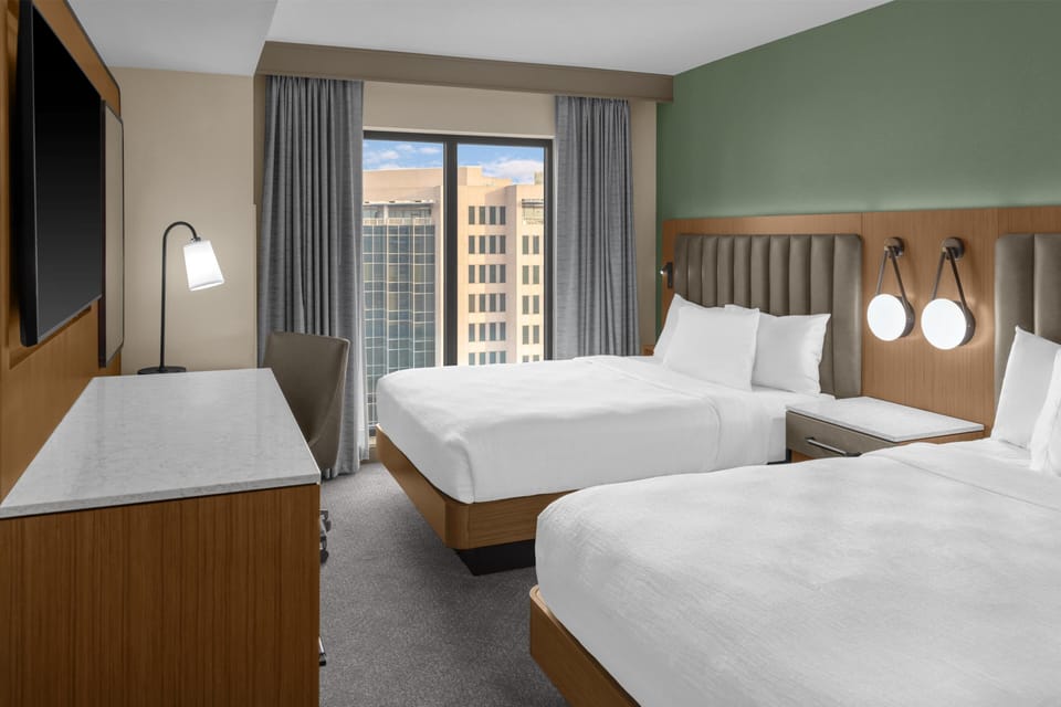 Hypo-allergenic bedding, pillowtop beds, in-room safe, desk