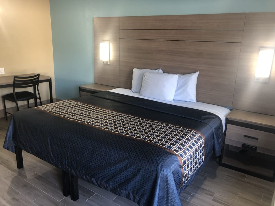 Blackout drapes, WiFi (free), bed sheets
