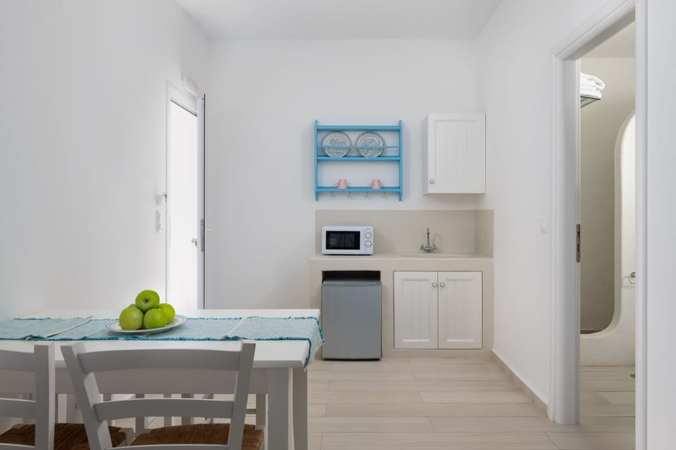 Aegean Luxury Suites | Premium bedding, pillowtop beds, in-room safe, laptop workspace