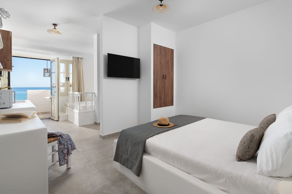 Akti Luxury Suites | Premium bedding, pillowtop beds, in-room safe, laptop workspace