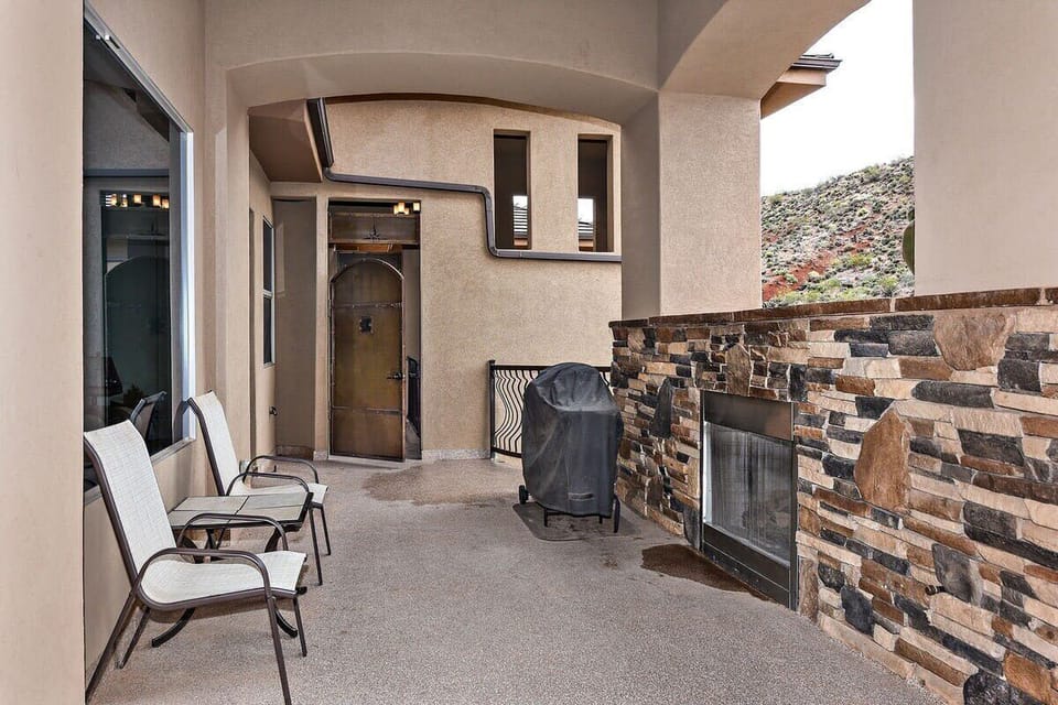 Patio With Fireplace and Grill