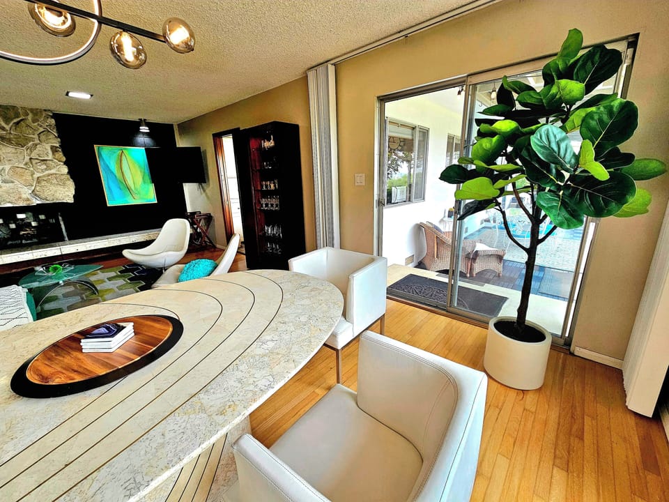Step outside to covered veranda from dining room area. 