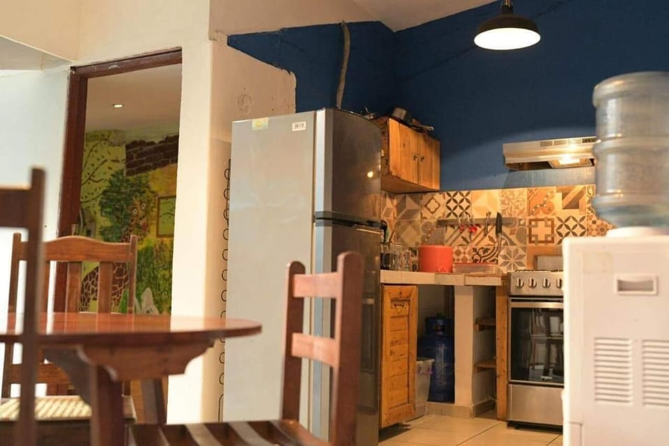 Deluxe House, 1 King Bed | Private kitchen | Full-size fridge, oven, stovetop, cookware/dishes/utensils