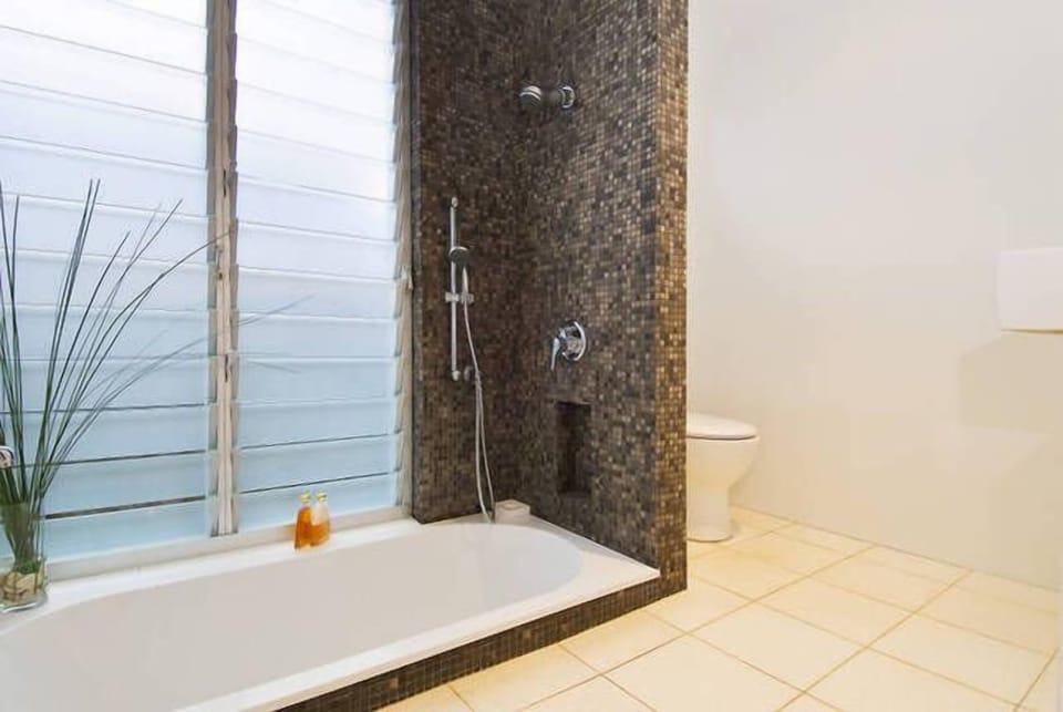 Main bathroom with sunken bath & shower