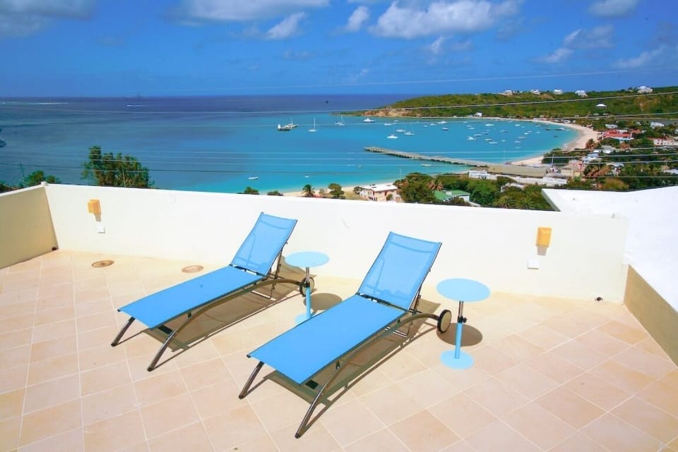 We have a unique upper level deck to sunbathe or simply enjoy the view.