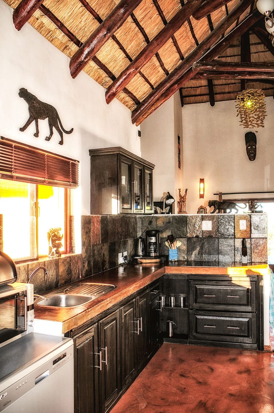kitchen with electrical stove, microwave, oven, dishwasher, fridge and freezer